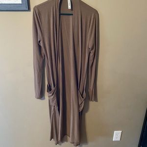 Long, brown sweater